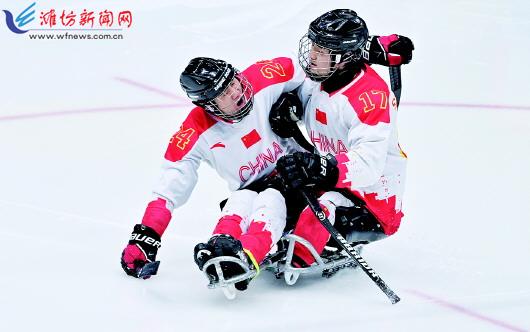 中国残奥冰球队赢得铜牌寿光小伙朱占福助攻三次