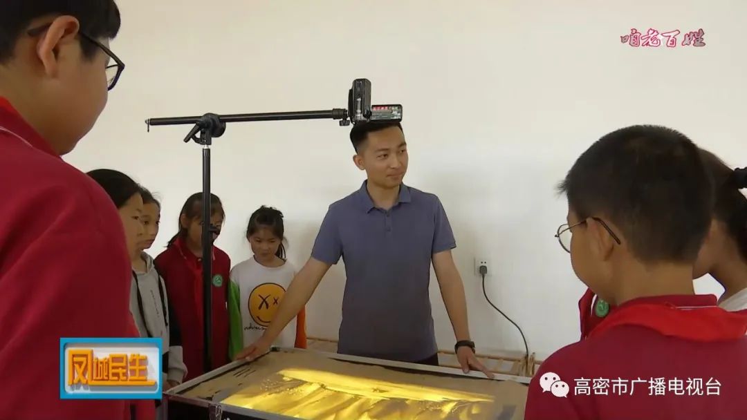 姜庄小学教师张国辉说:"沙画本身是一种具有流动性